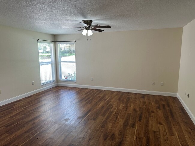Building Photo - Experience Maintenance-Free 55+ Living at The Cove at Tavares Village!