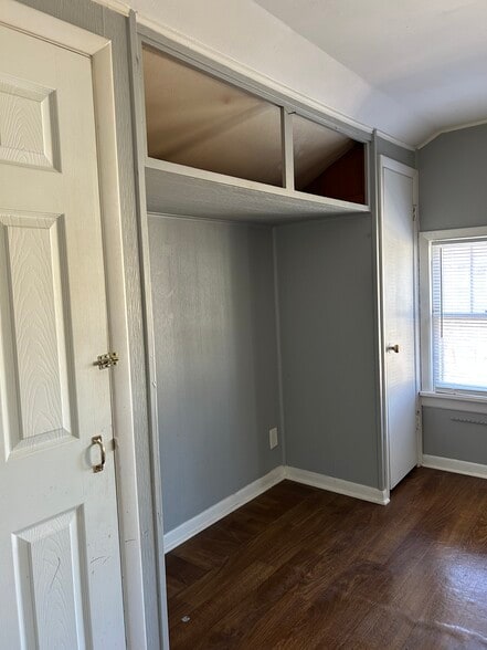 Front bedroom showing 2 or 3 small closets - 1012 W Armstrong Ave