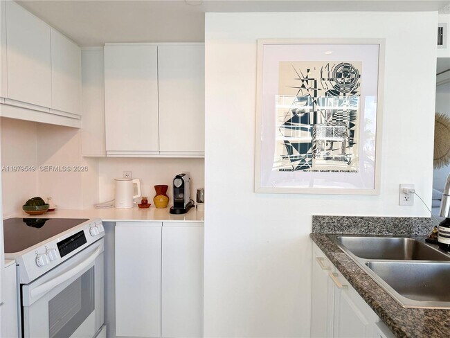 Building Photo - 8911 Collins Ave