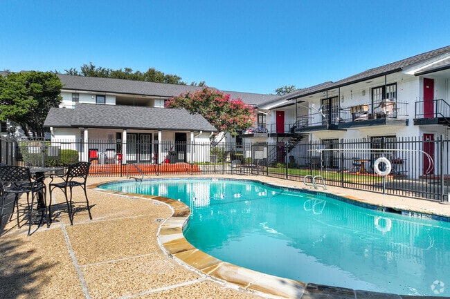 Resort-style pool with lounge seating, perfect for relaxing under the sun. - Renaissance Gardens