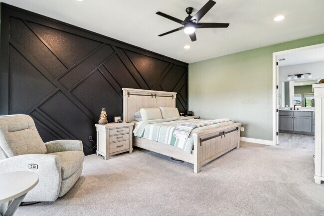 Building Photo - "Spacious 5-Bed Oasis with 4.5 Baths – You...