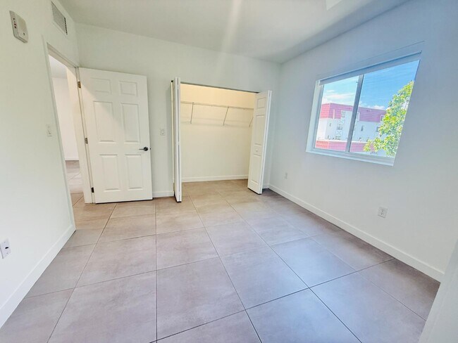 Building Photo - 1295 W 69th St