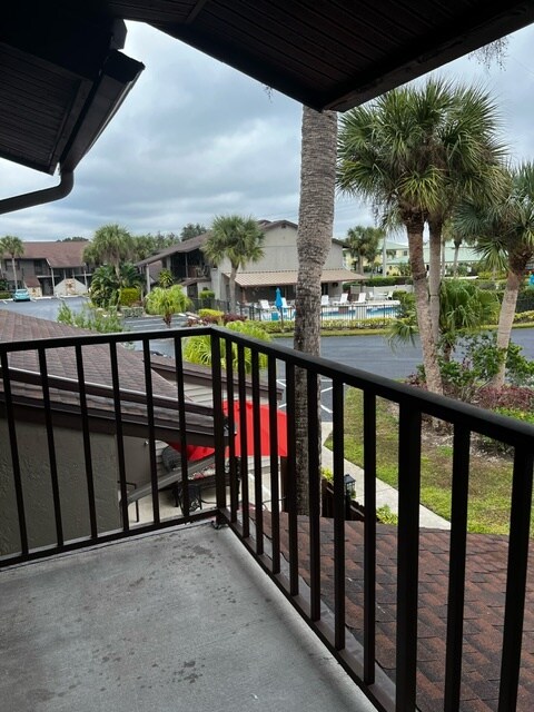 front balcony view of pool - 927 Capri Isles Blvd