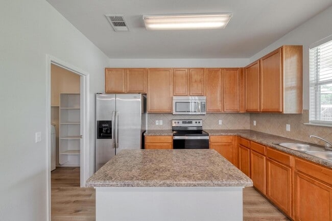 Building Photo - 9104 China Rose Dr
