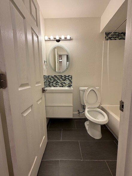 bathroom 1 - 6555 SW Terri Ct