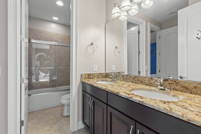 Building Photo - Luxury Waterfront Pool Home in Laureate Park | 4BR + Water Views