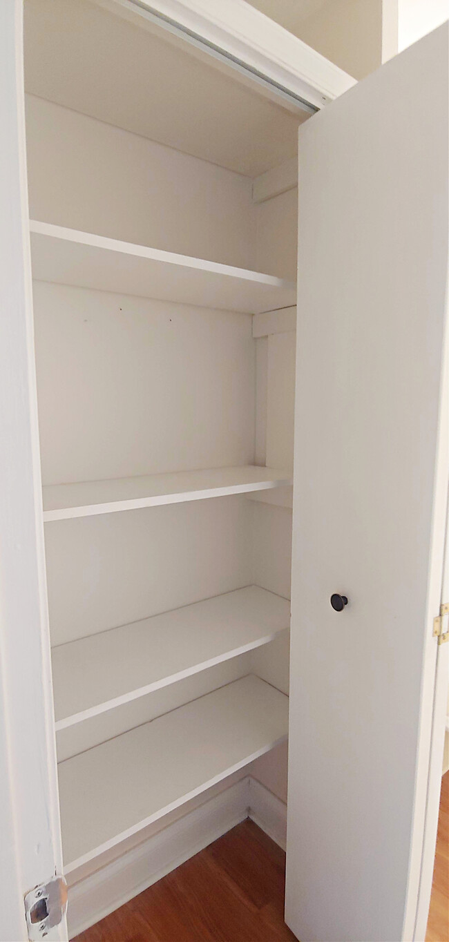 Bathroom storage closet, about 6' tall by 3' wide - 819 Page St