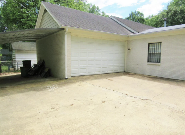 CARPORT AND GARAGE EXTERIOR - 1062 Sheridan St