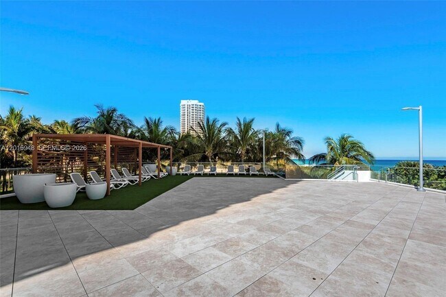 Building Photo - 7135 Collins Ave
