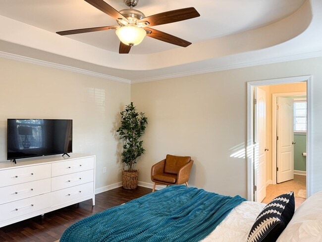 Building Photo - Spacious 3BR Home with Open Split Layout, Fenced Yard & Covered Front Porch