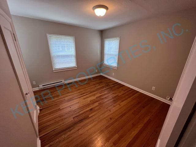 Building Photo - Charming 2-Bedroom Haven with Gleaming Har...