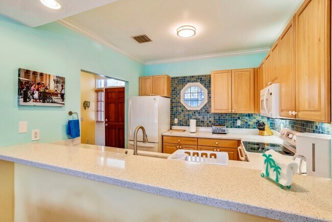 Building Photo - 6-MONTH RENTAL! Beautifully Furnished 3 Bed 2.5 Bath Home in the Sanctuary of the Key West Golf C...