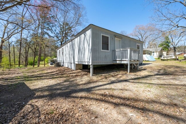 Building Photo - Move-In Ready Modern Makeover! Spacious 4-Bedroom Gem You’ll Love!