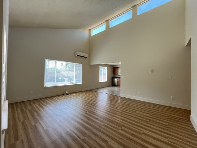 Building Photo - Bright and Airy Home with Stainless Steel Kitchen, Vaulted Ceilings & Washer + Dryer