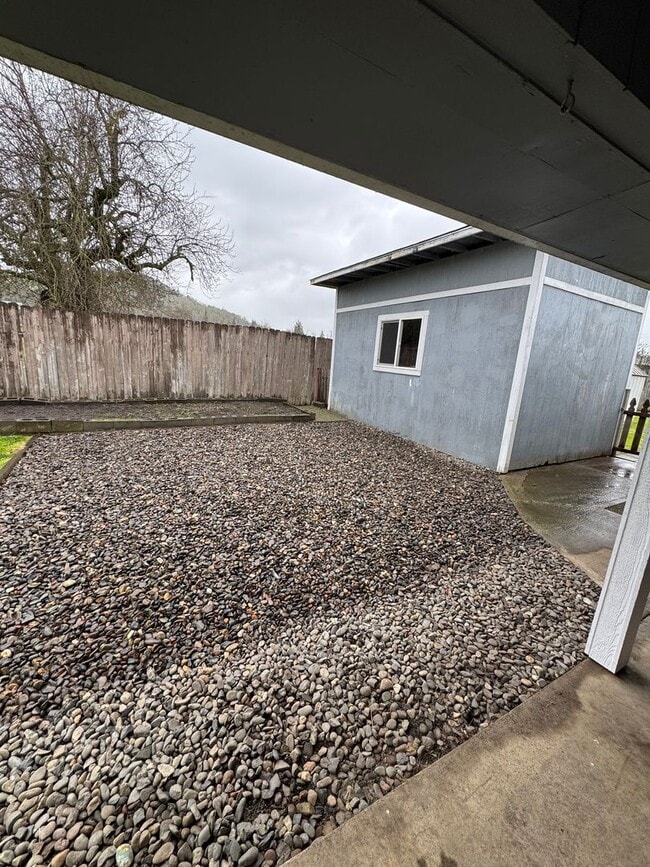 Building Photo - Winston 3 bedroom 2 bath with large storage shed and carport