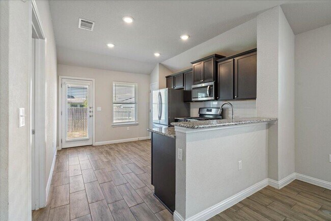 Building Photo - 8205 Cottage Rose Dr