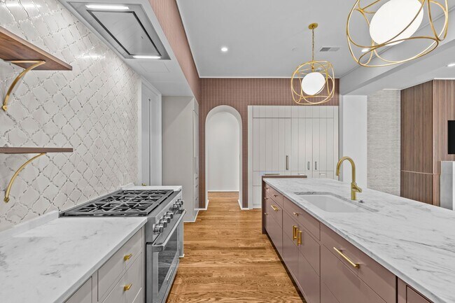 Building Photo - Rare opportunity to lease a luxury residence in The Nolen on Queens Road