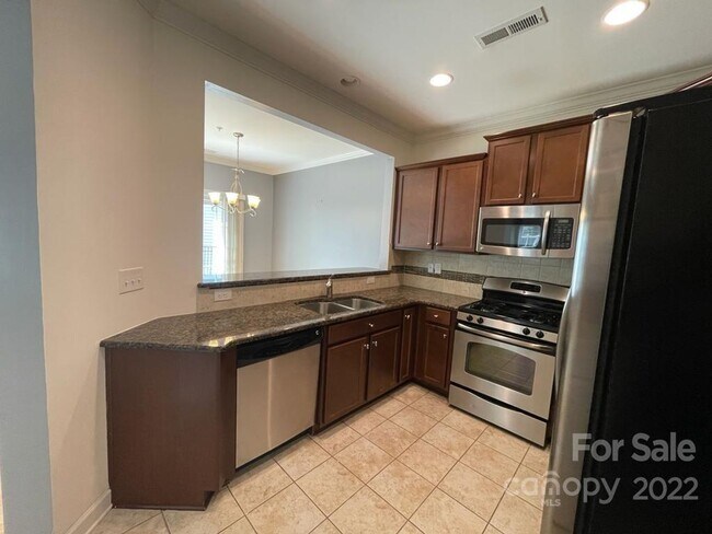 Building Photo - Short Term Rental Coming Soon! 3 BR/2.5BA | Renovated Townhome | 2-Car Garage Parking |Neighborho...