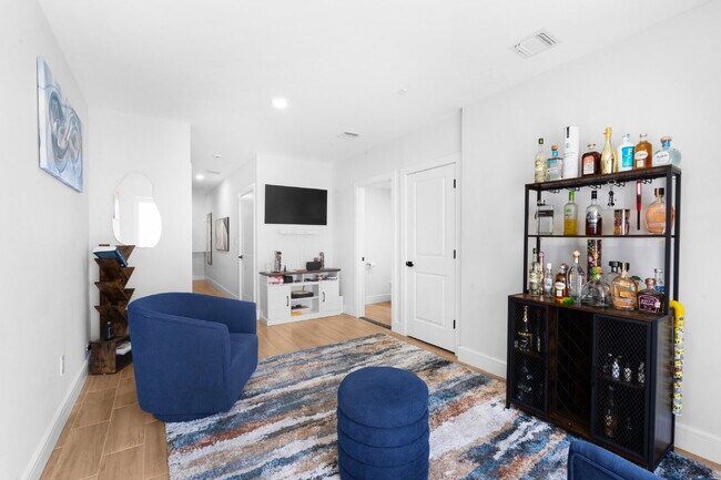 Building Photo - Movie in special, first 1/2 month rent is FREE! Charming 2-Bedroom Condo with 2 Full & 2 Half Bat...