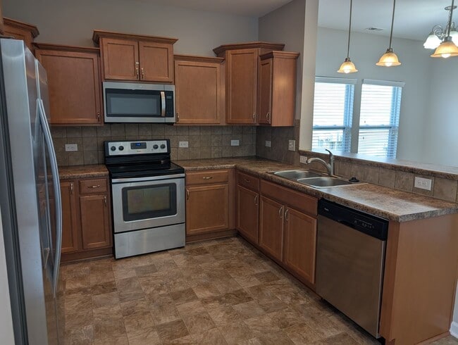 Building Photo - Pristine, move in ready Home located in th...