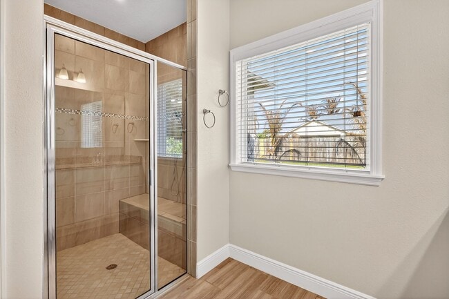 Building Photo - Modern 4-Bedroom Rental with Screened Patio & 2-Car Garage