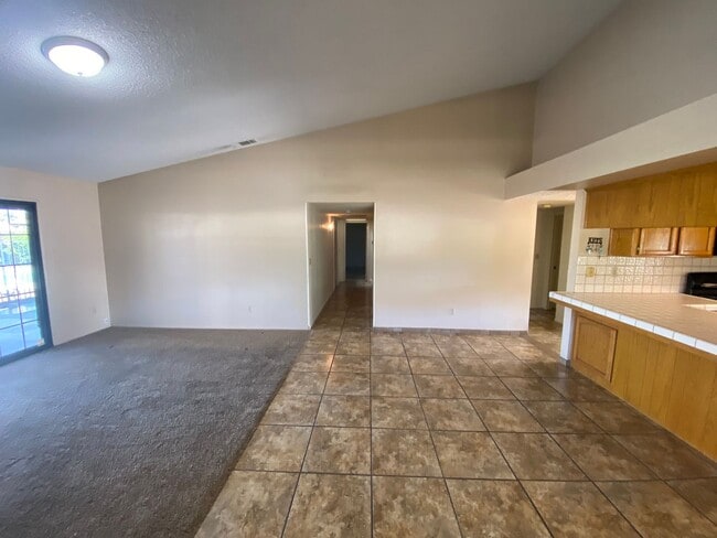 Building Photo - Get ready for Summer in this 3 BD 2 BA SW home with a Pool on a corner lot