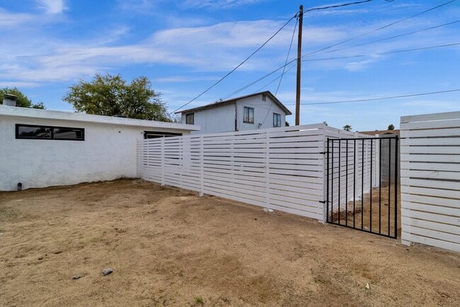 Building Photo - NEW Everything W/ Large Private Fenced yard