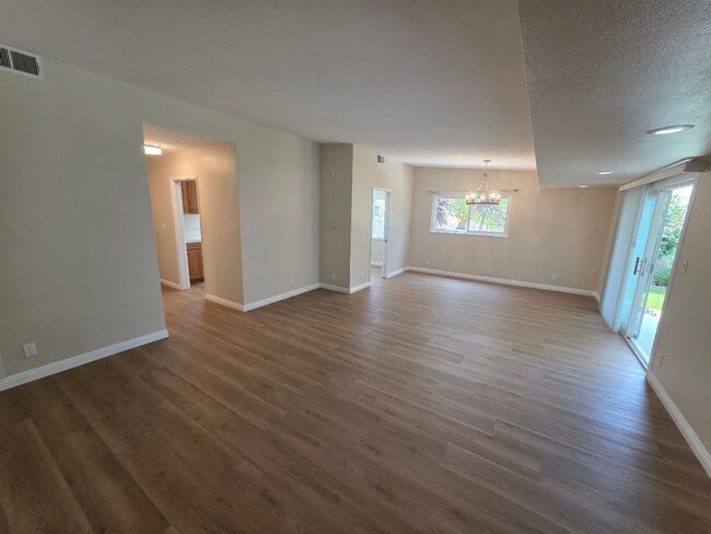 Building Photo - TURNKEY-RENT READY SPACIOUS 2BD/2BA HOME, 2-CAR GARAGE WITH AN AUTOMATIC ROLL-UP DOOR, LARGE COVE...