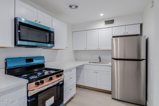 Building Photo - 936 W Rio Salado Pkwy