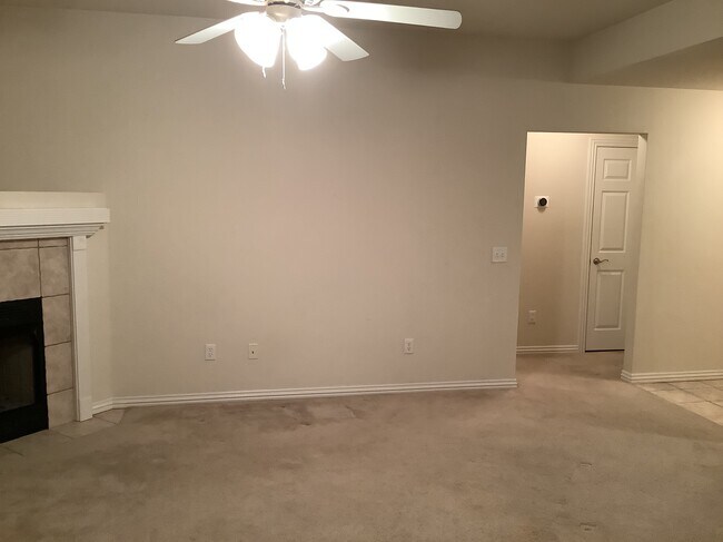 Living room (guest rooms left and right of hallway on the right) - 431 Firewood Dr