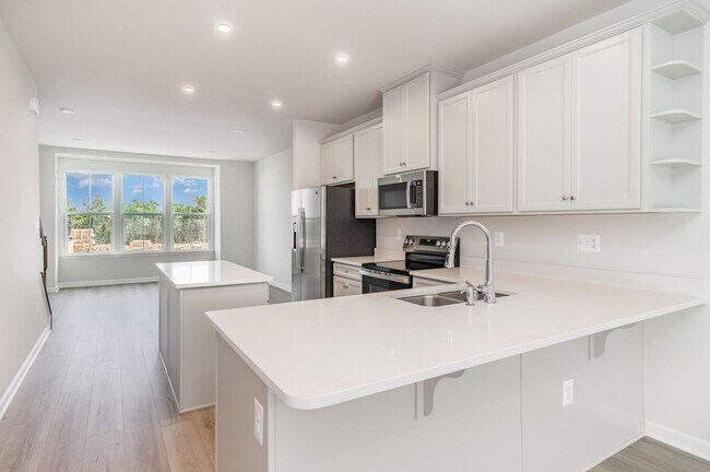 Building Photo - New Construction 3 Bedroom Townhome in Fre...