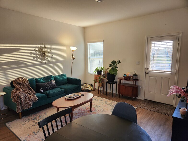 Living room with lots of natural light. (House will be unfurnished.) - 13306 Mussel Run