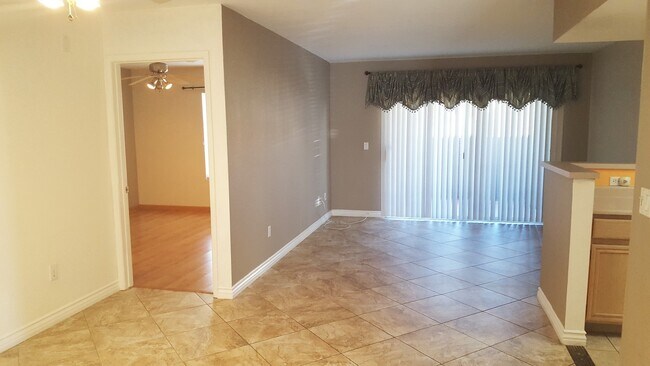 Building Photo - Three Bedroom Southwest Condo, Tile, Ground Floor
