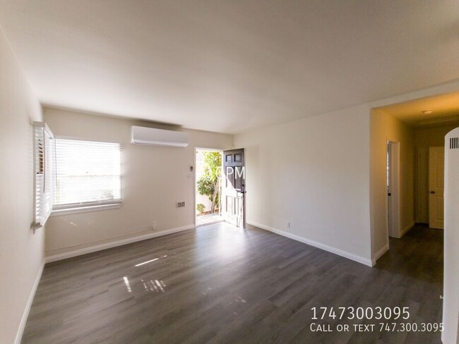 Building Photo - Beautifully Renovated 1-Bedroom in heart o...