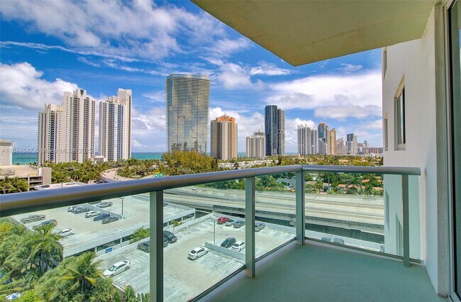 Building Photo - 19380 Collins Ave