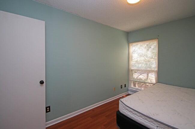 Building Photo - "Rent a room in this 4-Bedroom Furnished T...
