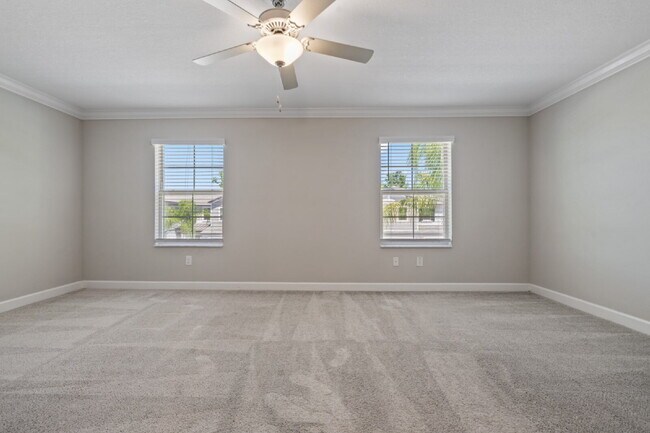 Building Photo - "Spacious 4-Bed Oasis with Granite Charm in Lutz!"In a gated community with 2 Cars garage
