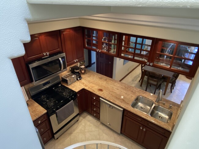 Kitchen view from spiral staircase - 5146 Dorado Dr