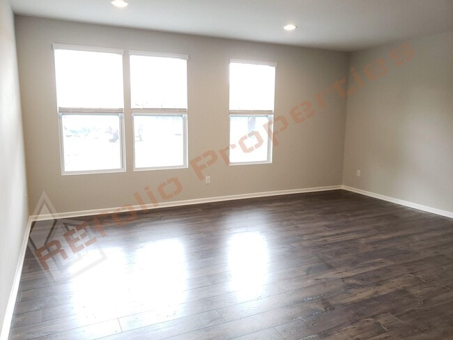 Building Photo - Beautiful Luxury 3 Story 3 Bedroom Townhome with 1st Floor Guest Suite, Attached 2 Car Garage, Co...