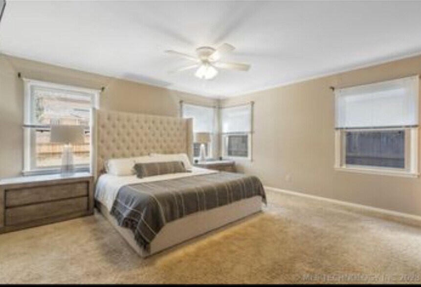 primary bedroom - 3235 S Troost Ave