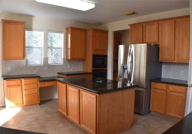 Building Photo - 9106 Memorial Pines Way