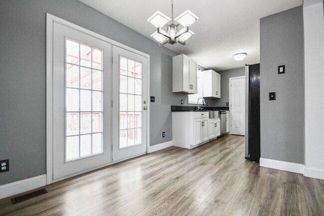 Building Photo - Pet Friendly Three Bedroom with Basement!