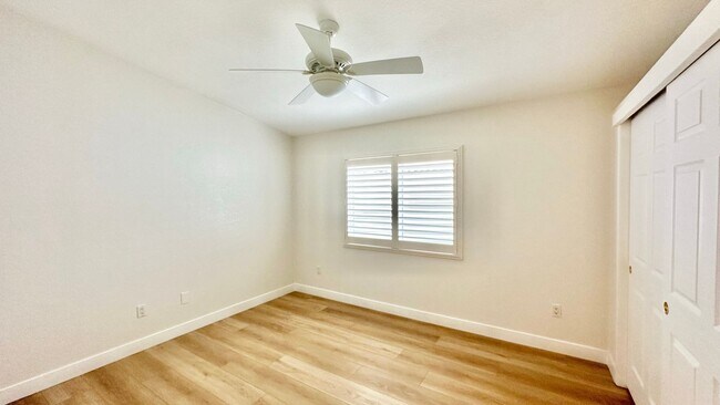 Building Photo - Light, Bright, and Freshly Updated Home in the Gated & Desirable Champagne Village 55+ Community!