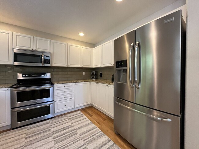 Building Photo - Spacious 3-Bedroom Home with Two Living Areas, Private Balcony, Fireplace & Attached 2-Car Garage