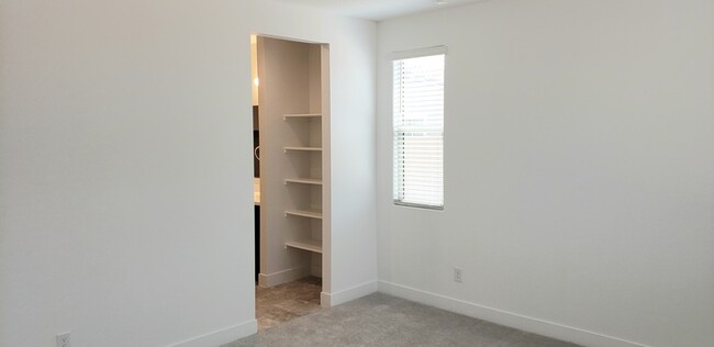 Building Photo - The 2 YEARS NEW 4 bedroom + 3 car garage r...