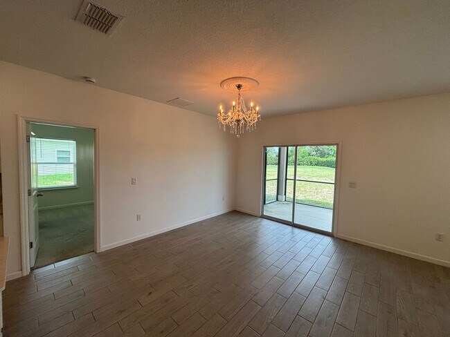 Building Photo - Stunning 3 Bedroom 2 Bath, Great Location! (Freedom Crossing Preserve)
