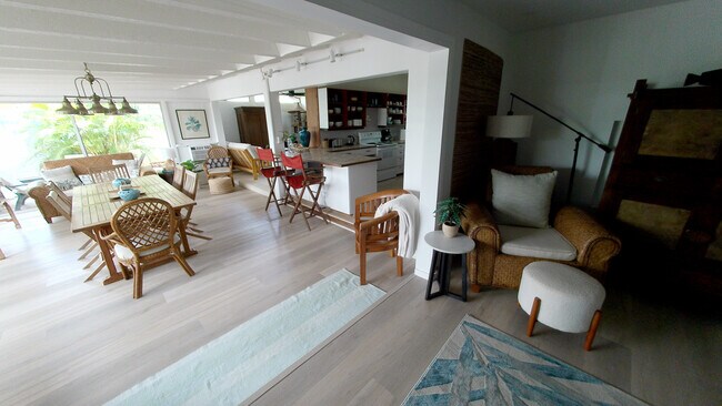 Open plan view of dining and kitchen areas from sitting room - 426 Ilimano St