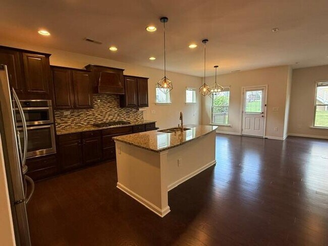 Building Photo - 1009 Magnolia Blossom Ln
