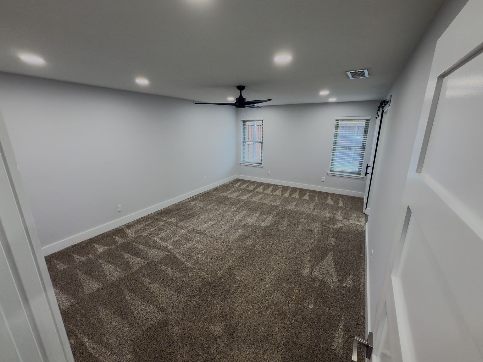 Bedroom with ceiling fan, recessed lighting, and multiple windows - 2006 Candle Ct