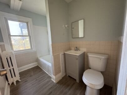 Building Photo - "Charming 4-Bed Upper Level Retreat with Hardwood Elegance in (Powderhorn) Minneapolis!"